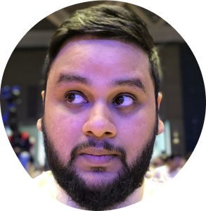 A photo of Rohit looking at the text "Hello and Namaste"